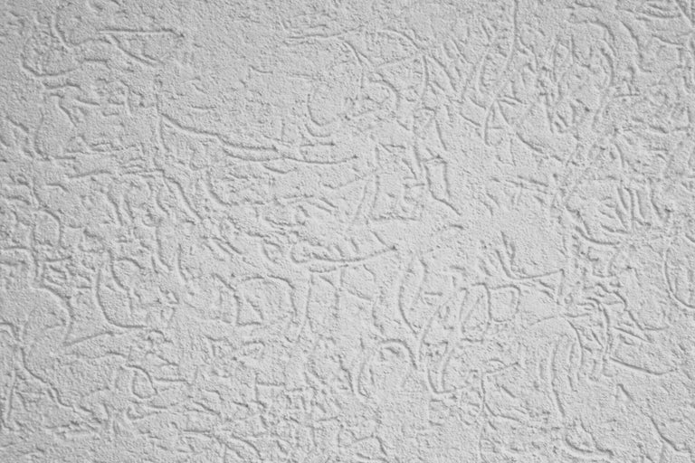 Prim-plan cu un perete cu tencuială zgâriată