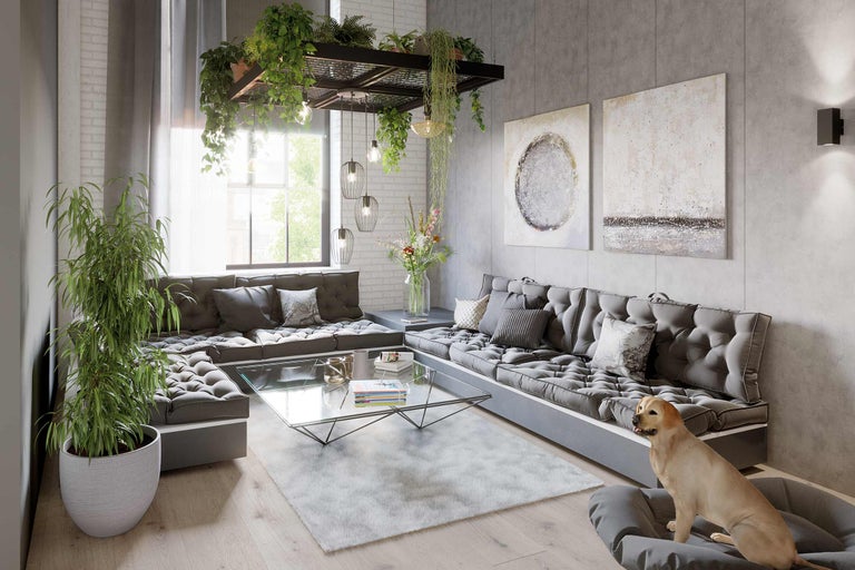 Living cu zonă de relaxare gri, măsuță de cafea din sticlă și decorațiuni precum plante și picturi