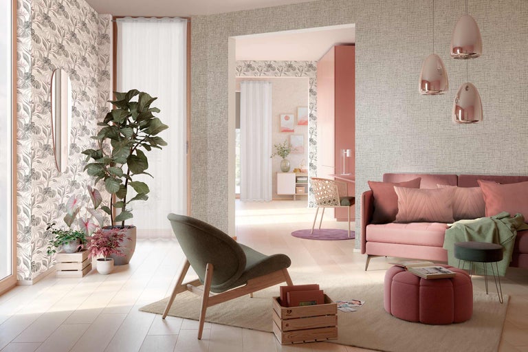 Cameră de zi cu canapea, fotoliu, plante și decorațiuni murale decorative pentru o atmosferă confortabilă