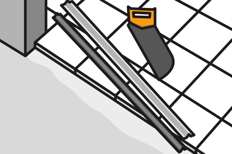 Ilustrație cu șine de faianță și un ferăstrău manual pe faianță