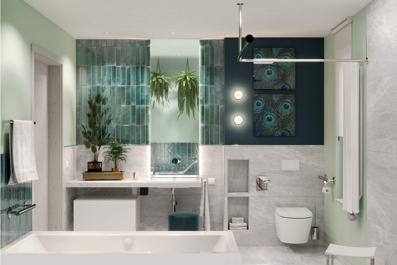 Baie modernă cu cadă, lavoar și toaletă într-un design luminos
