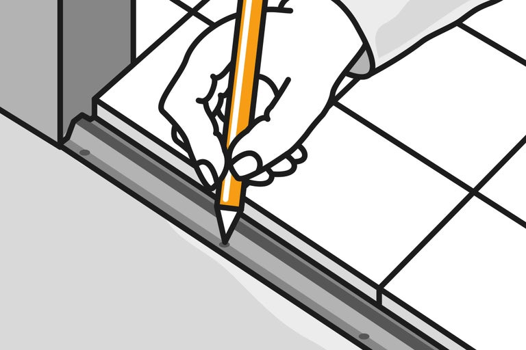 O mână trasează cu un creion o linie de-a lungul unei rigle pe o foaie de hârtie.