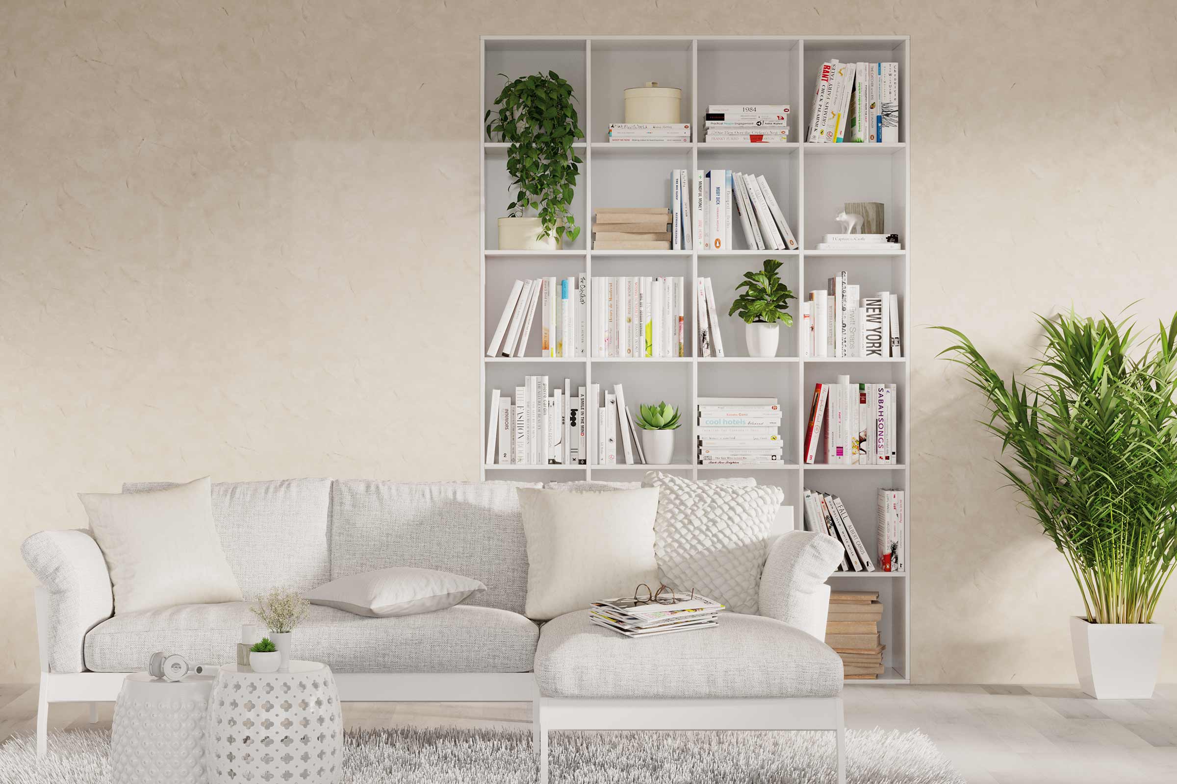 Cameră de zi cu bibliotecă albă, canapea, plante de interior și decorațiuni