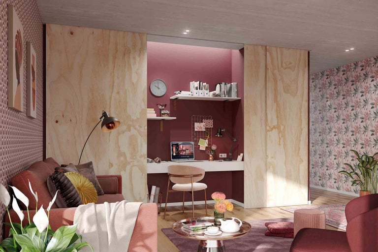 Cameră de zi cu zonă de lucru, canapea, masă și mobilier de birou într-un design luminos și organizat.