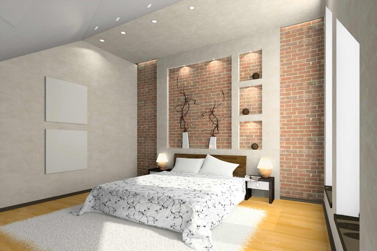 Dormitor cu pat dublu, noptiere și perete de cărămidă