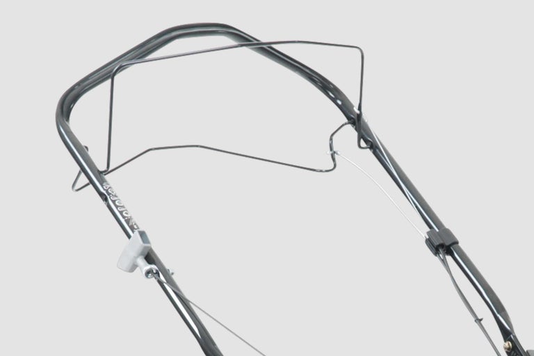 Mânerul unei mașini de tuns iarba