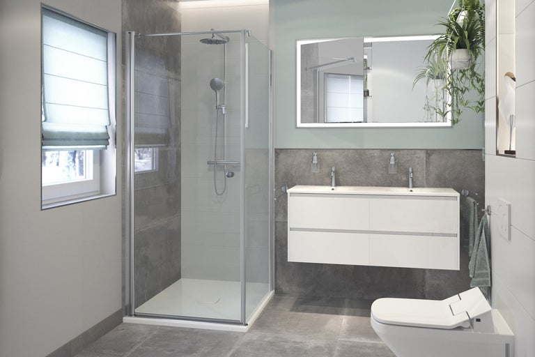 Baie modernă cu duș, lavoar și toaletă.