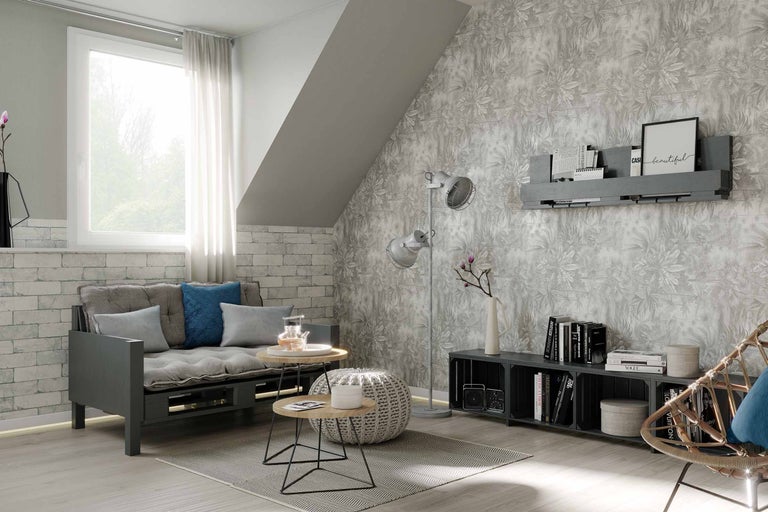 Living cu canapea extensibilă, lampadar, măsuță de cafea și design decorativ al pereților.