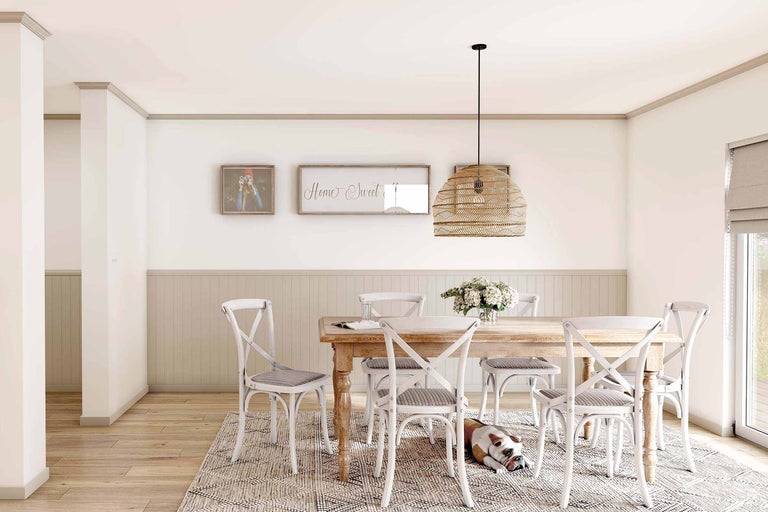 Sufragerie cu masă din lemn, scaune, lampă suspendată și covor