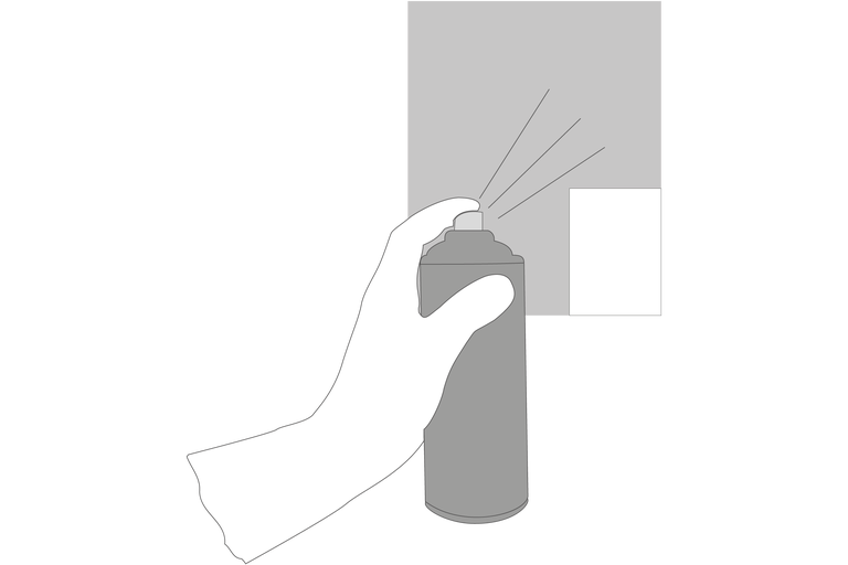 Mână pulverizând vopsea dintr-un recipient spray