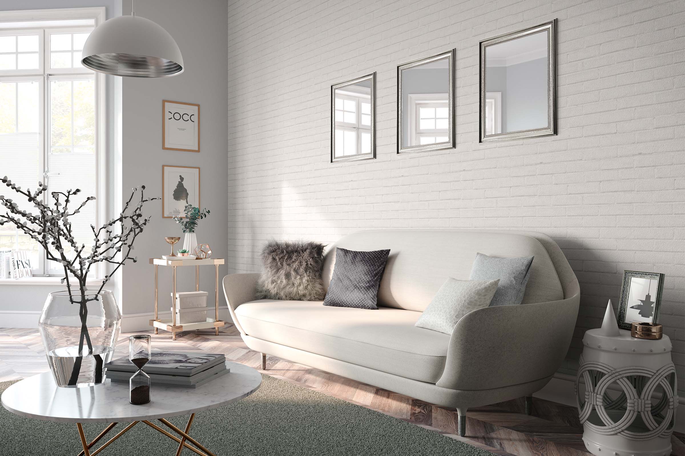 Living luminos cu canapea, măsuță de cafea, măsuță laterală și decorațiuni de perete în fața unui perete de cărămidă