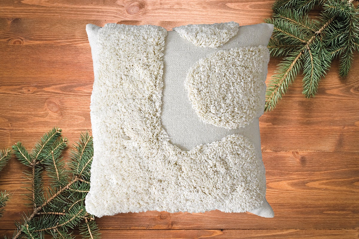 Pernă pătrată cu forme abstracte și textură moale