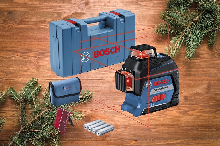 Laser de linii Bosch GLL 3-80 Professional cu accesorii pe fundal de lemn