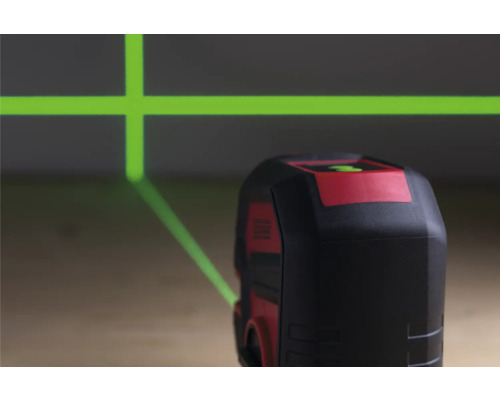 Laser cu linii în cruce proiectează linii laser verzi pe perete.