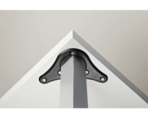 Prim-plan cu prinderea piciorului mesei cu șuruburi de blatul mesei