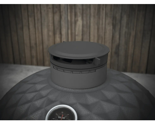 Vedere de sus a unui grătar cu cărbune cu afișaj de temperatură.