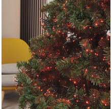 Prim-plan cu un brad de Crăciun cu lumini roșii