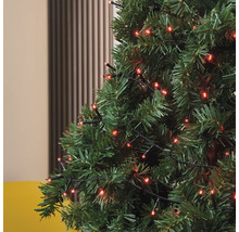 Prim-plan cu brad de Crăciun cu luminițe roșii