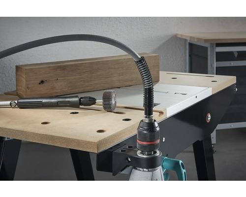 Arbore flexibil cu disc abraziv pe un banc de lucru