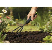 Sapa de grădină utilizată într-un strat de grădină