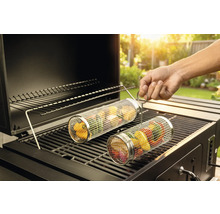 Rulou pentru legume pe un grătar cu alimente la grătar