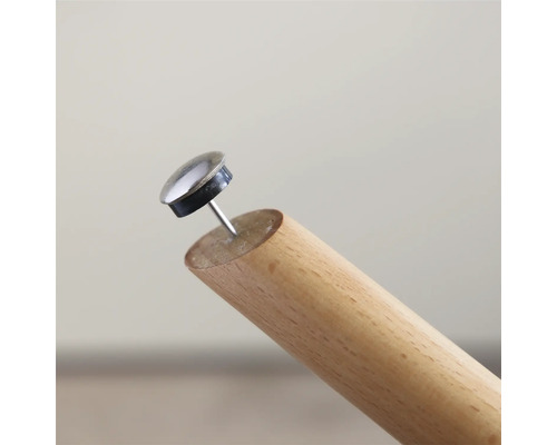 Glisor de mobilă cu cui pe un picior de lemn