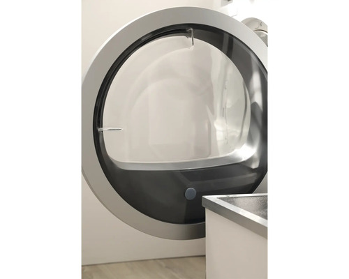 Ușă deschisă a mașinii de spălat