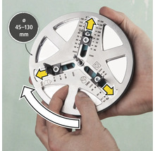 Un instrument pentru marcarea precisă a găurilor de foraj cu un diametru de 45 până la 130 de milimetri este ținut de două mâini.