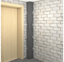 Colț de cameră cu izolație interioară și zid de cărămidă