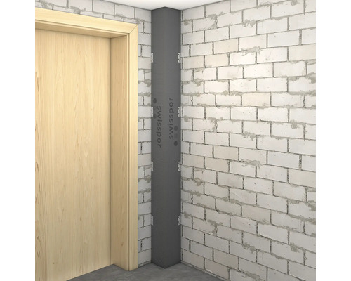 Colț de cameră cu izolație interioară și zid de cărămidă