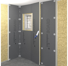 Colț de cameră cu elemente Swissspor Board atașate și etanșant