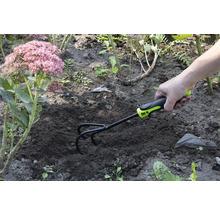 Săpăligă de grădină utilizată pentru pregătirea solului în grădină.