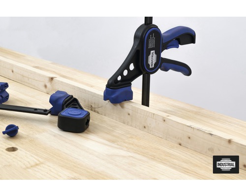 Clește cu arc din plastic pentru fixarea lemnului