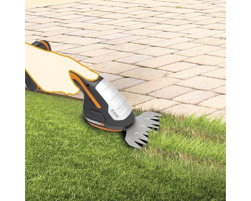 Foarfece de iarbă cu acumulator în uz pentru tăierea marginilor gazonului