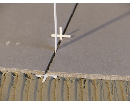 Montare gresie cu distanțiere și sistem de nivelare