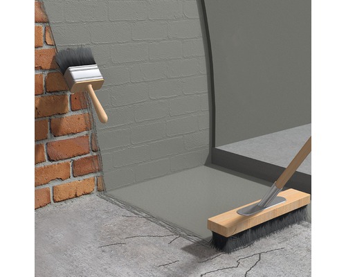 Imagine cu zidărie etanșată cu un material de etanșare, folosind o pensulă și o perie lată.