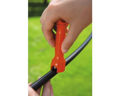 Perforator pentru furtun de grădină în uz