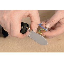 Instrument de dezizolat folosit pe cabluri electrice