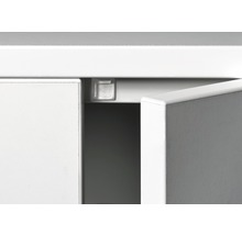 Imagine detaliată a unei piese de mobilier cu ușă și opritor transparent