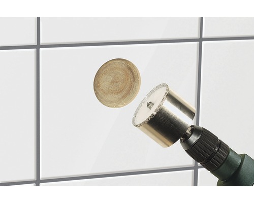 Freza de găurit faianță realizează o gaură într-o faianță