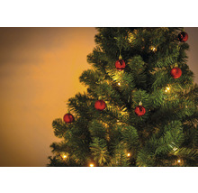 Pom de Crăciun decorat cu globuri și lumini