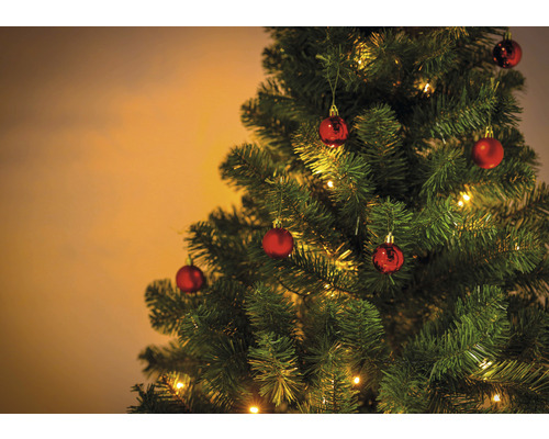 Pom de Crăciun decorat cu globuri și lumini