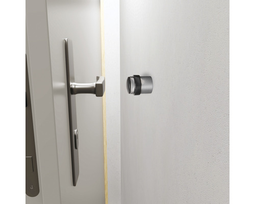 Ușă cu clanță și opritor de ușă de perete