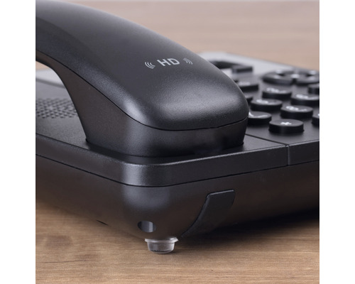 Prim-plan cu un telefon de birou negru cu funcție HD