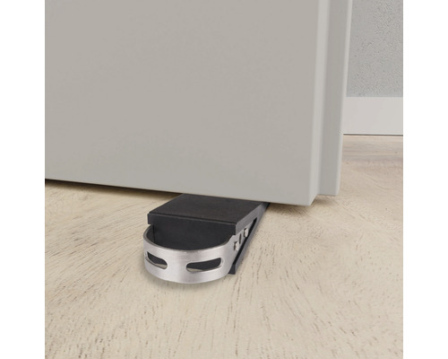 Opritor de ușă din metal și cauciuc care fixează o ușă