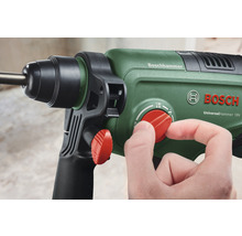 Prim-plan cu ciocan rotopercutor Bosch cu buton rotativ și mână