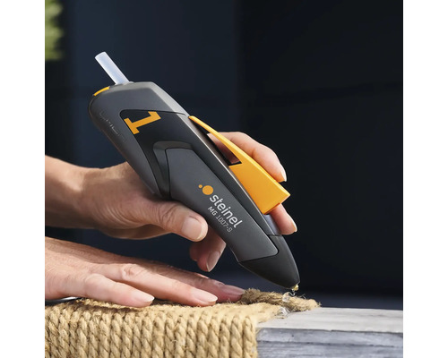 Pistol cu adeziv topit Steinel MG 1007-S utilizat pe o coardă