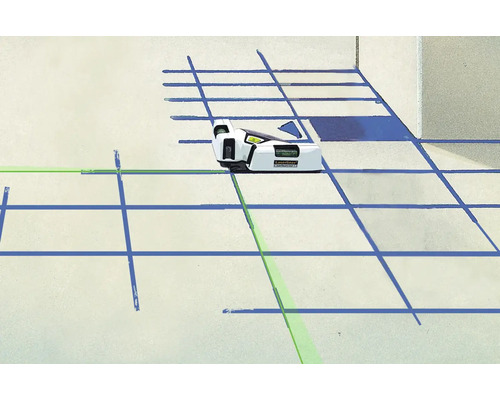 Laser de linie proiectând o linie laser verde pe podea