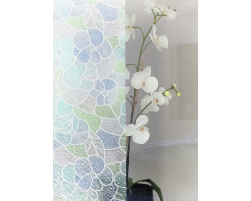 Folie decorativă cu model floral lângă o orhidee albă