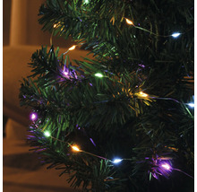 Ghirlandă luminoasă cu lumini multicolore pe un brad de Crăciun